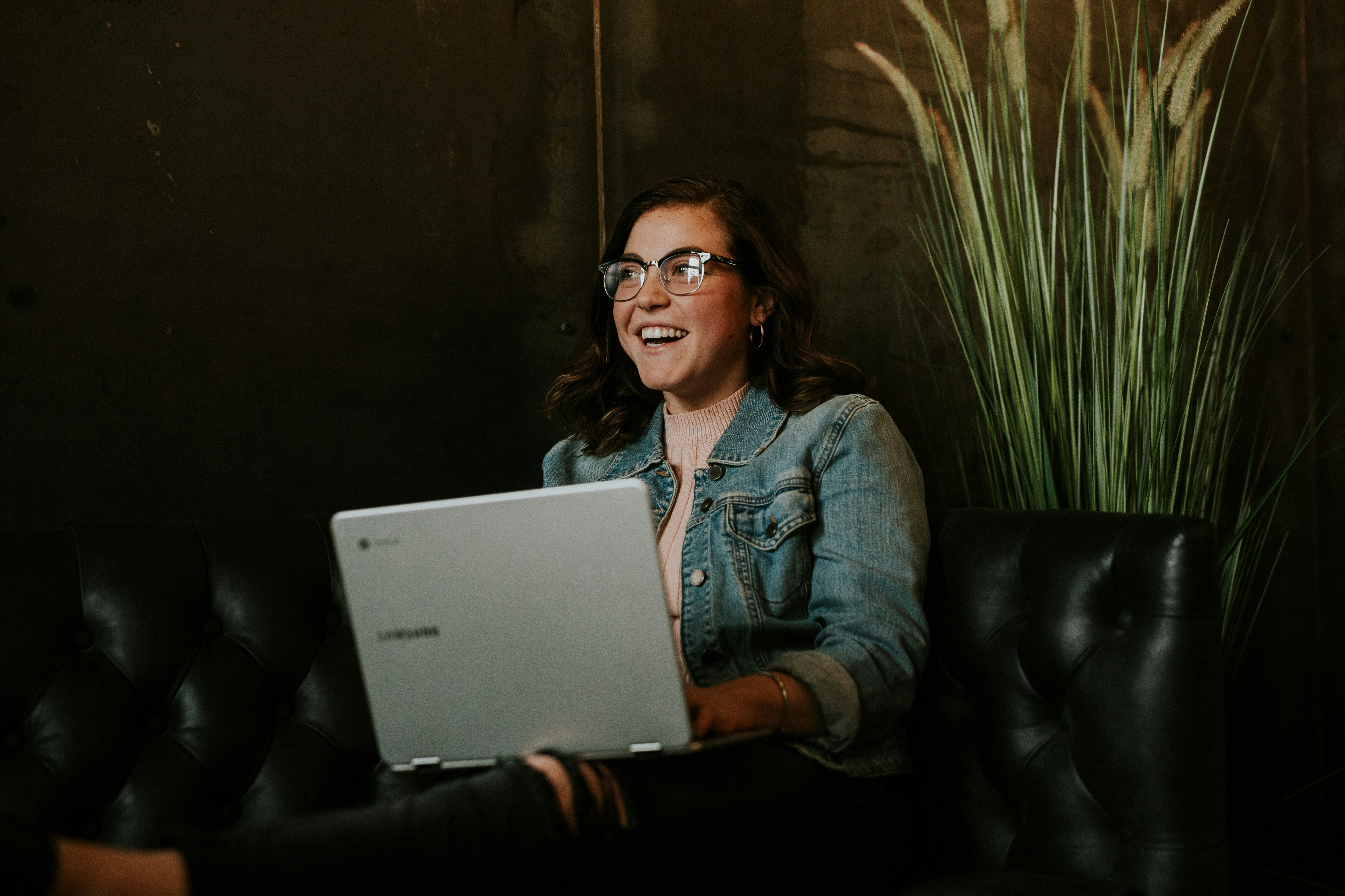 Confident student studying online on a laptop, representing the reality behind online degree myths