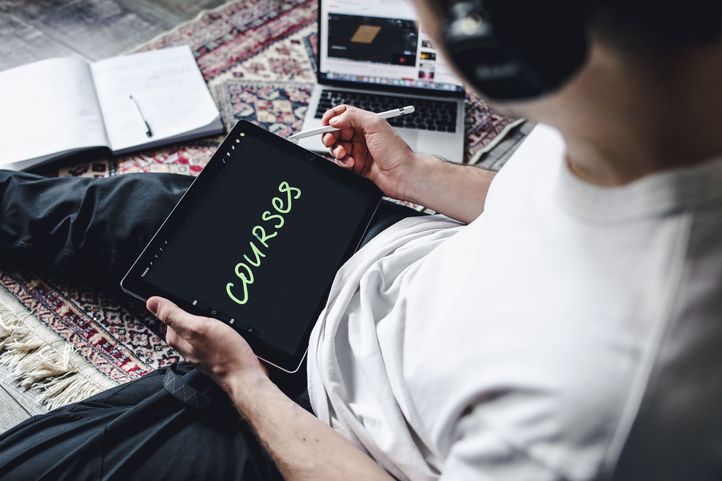 Student studying for an online degree on a laptop at home